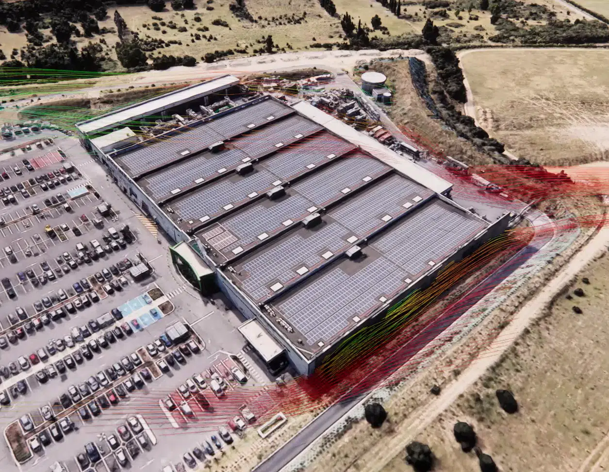 Simulation CFD – Carte de vitesses du vent sur un site commercial en vue aérienne – Évaluation du risque éolien et du confort des piétons