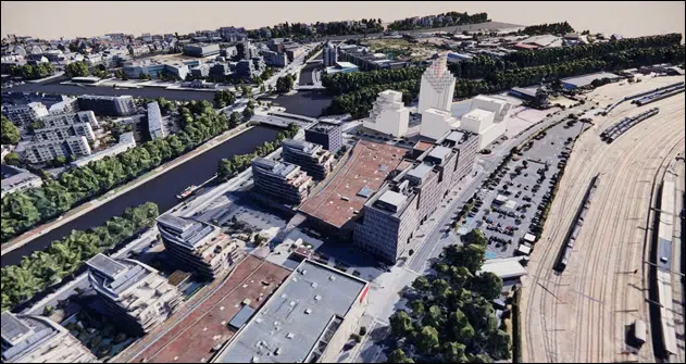 Vista aérea del barrio de Caen con el edificio alto torre Cascades y las vías de ferrocarril circundantes