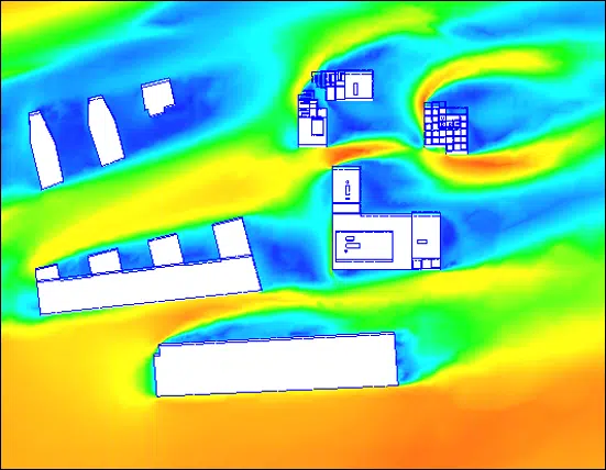 Mapa CFD de la distribución de las velocidades del viento vista desde arriba sobre un barrio — efecto Venturi, colormap térmico